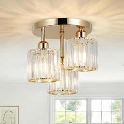 3-Light gold crystal semi-flush mount ceiling light installed in a room