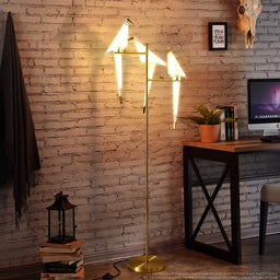 Nordic Bird Floor Lamp beside desk