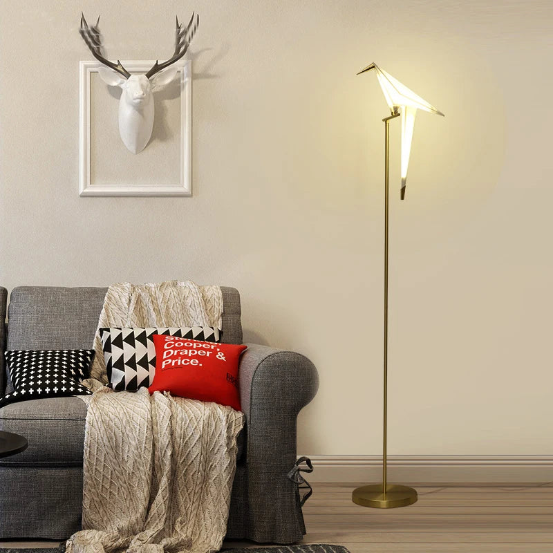Nordic Bird Floor Lamp beside sofa