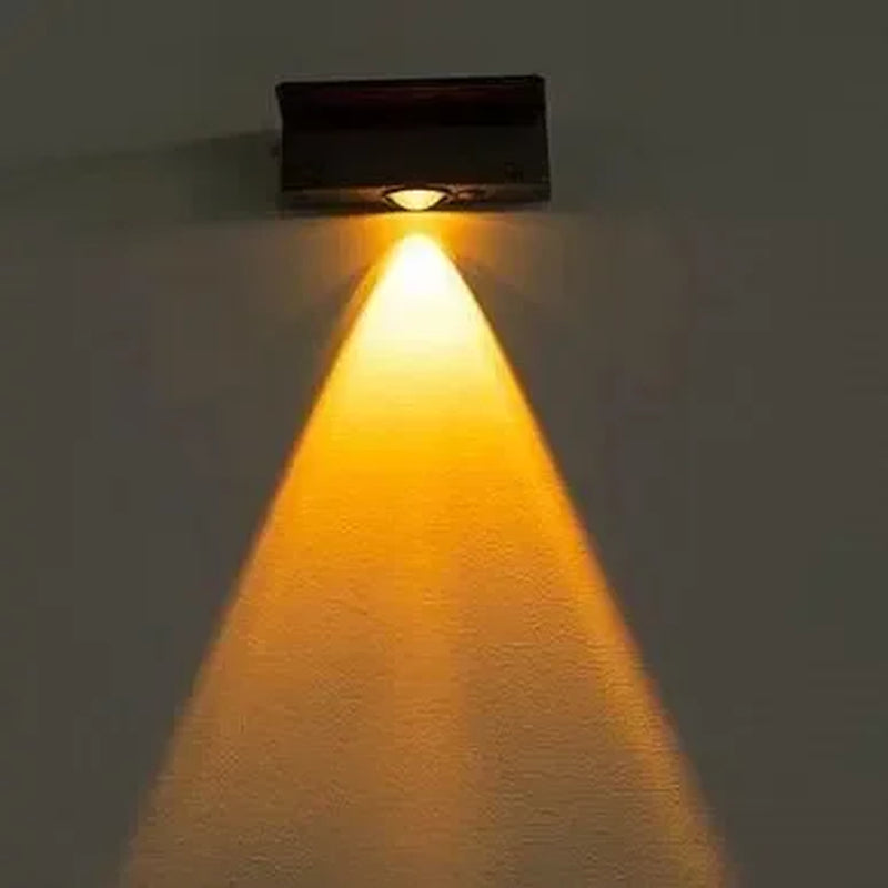 Square solar outdoor wall light mounted on a wall